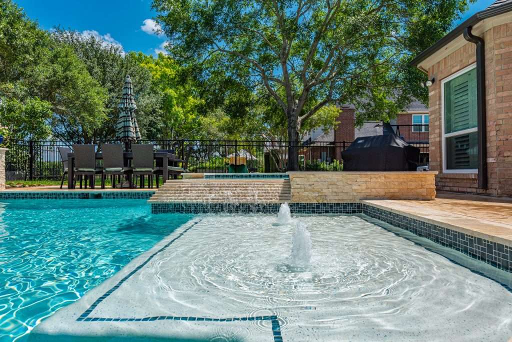 Fountain in backyard pool.